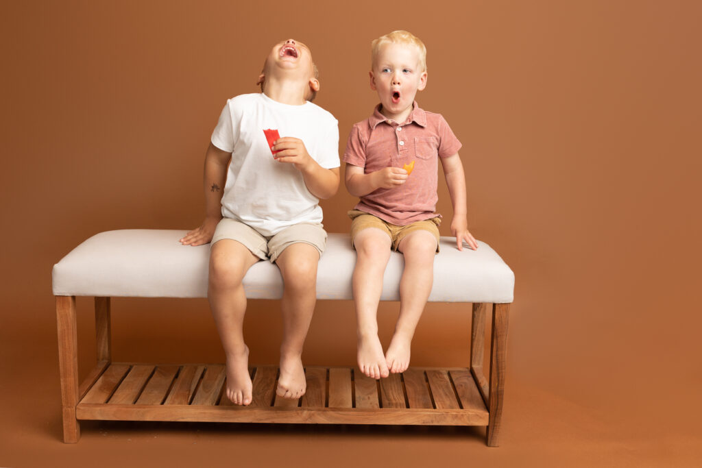 Boys laughing on a bench— Northeast Ohio family photography