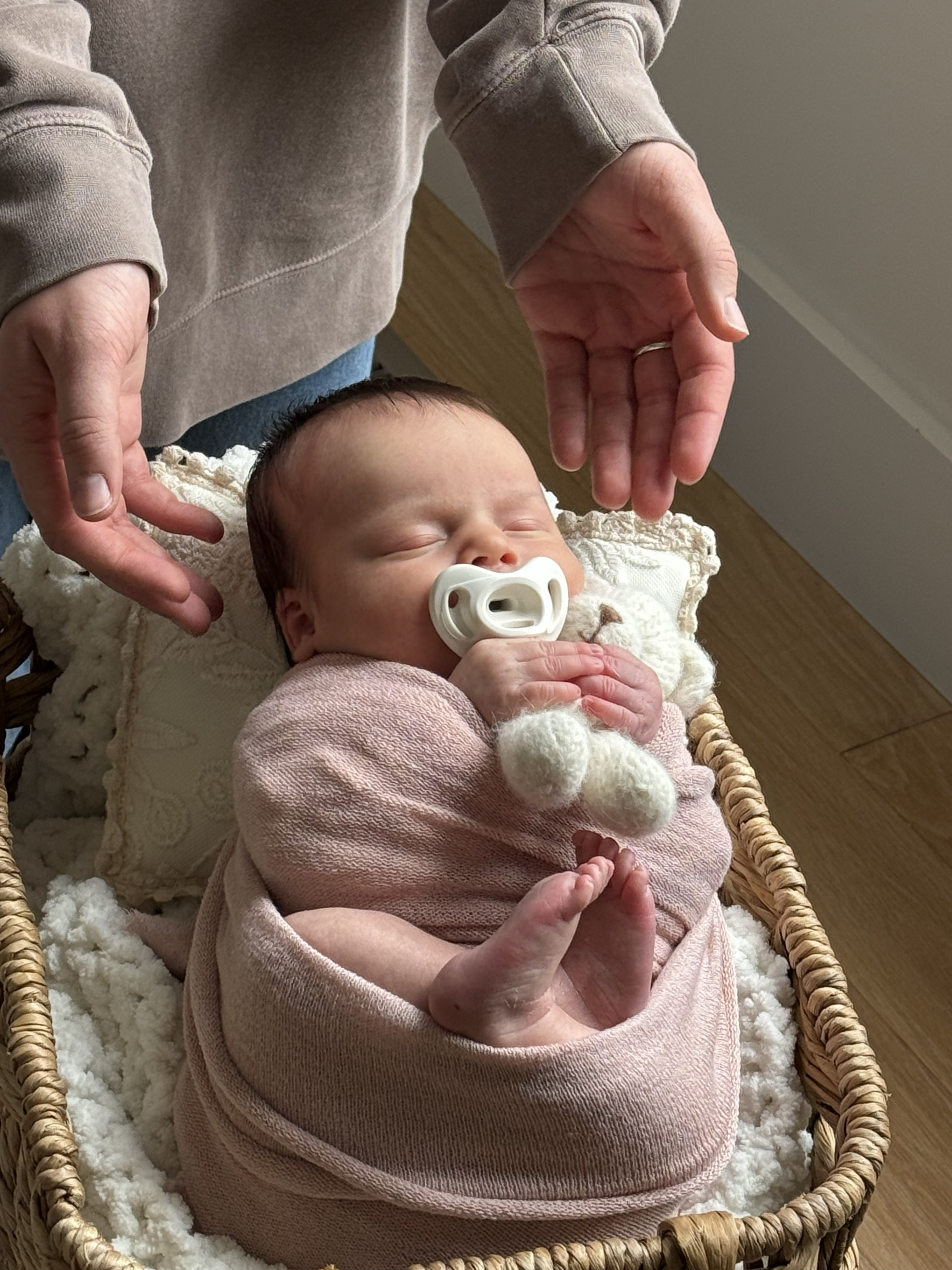 safety in posing newborns is critical. a spotter helps to ensure babies are carefully posed and safe