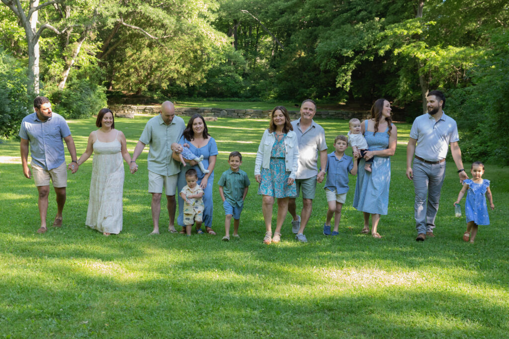 beautiful extended family walking in a park together